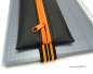 Preview: stiftemaeppchen-schwarz-neon-orange